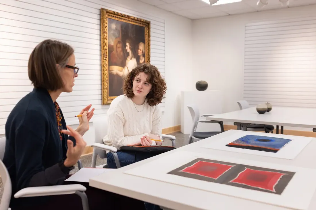 Professor Sascha Scott teaching a curator class to graduate students.